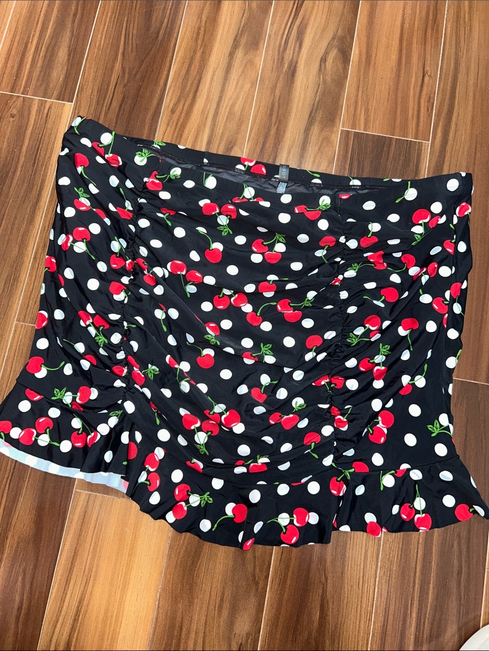 Size 4 Torrid Swim skirt cherry polka dot print